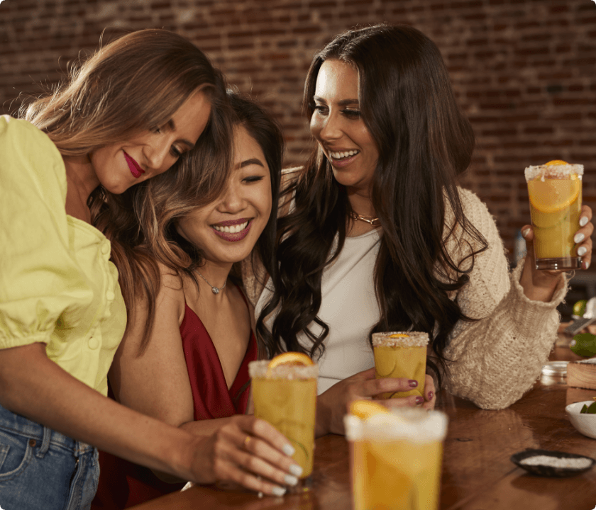 Lifestyle photo women enjoying drinks